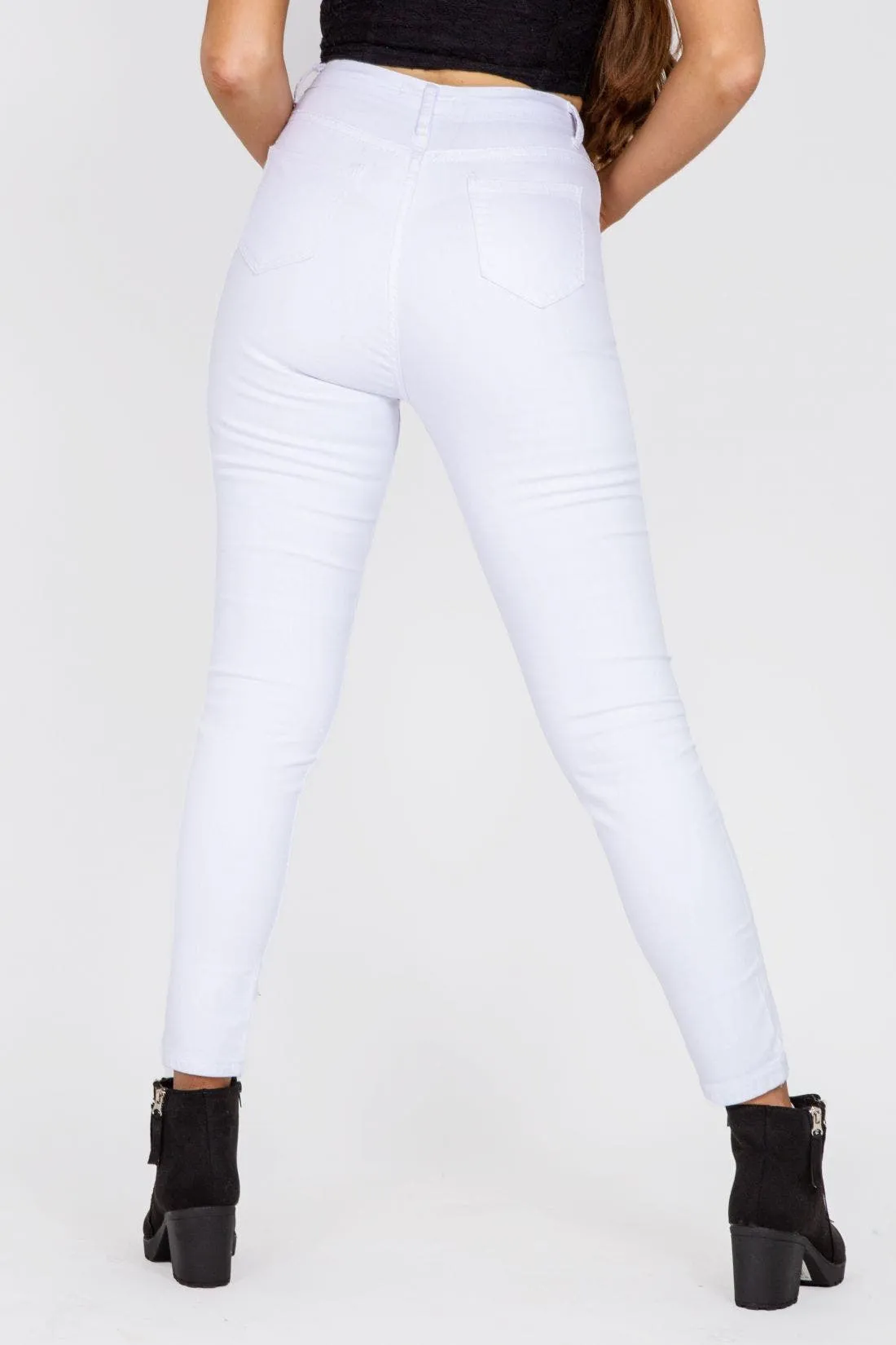 White Mid Rise Skinny Jeans