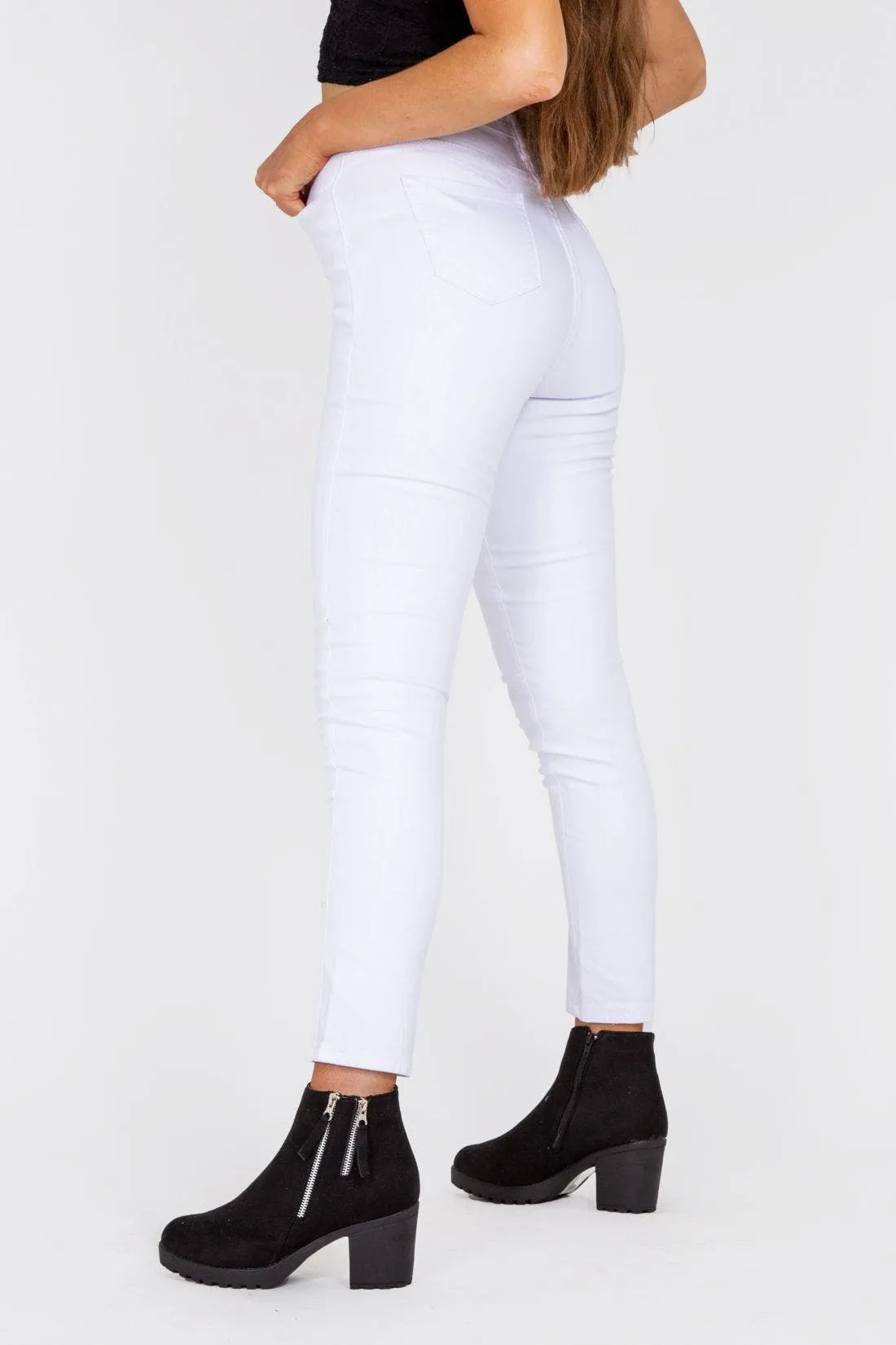 White Mid Rise Skinny Jeans