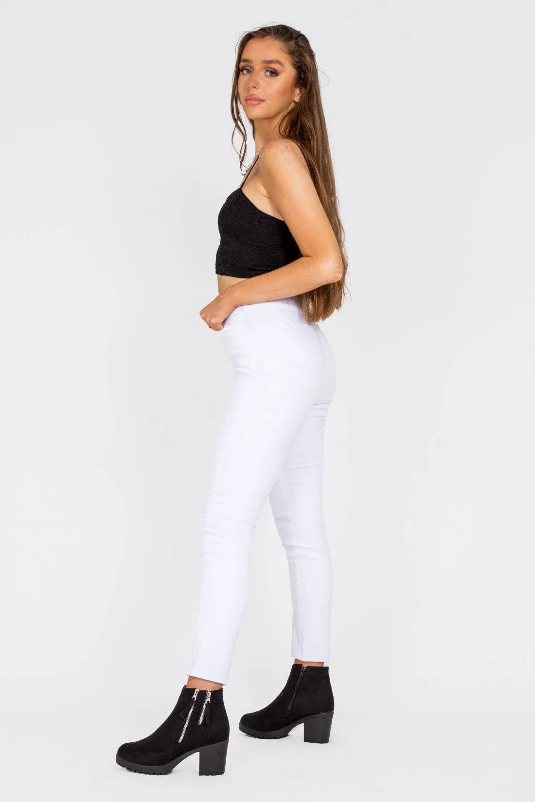 White Mid Rise Skinny Jeans